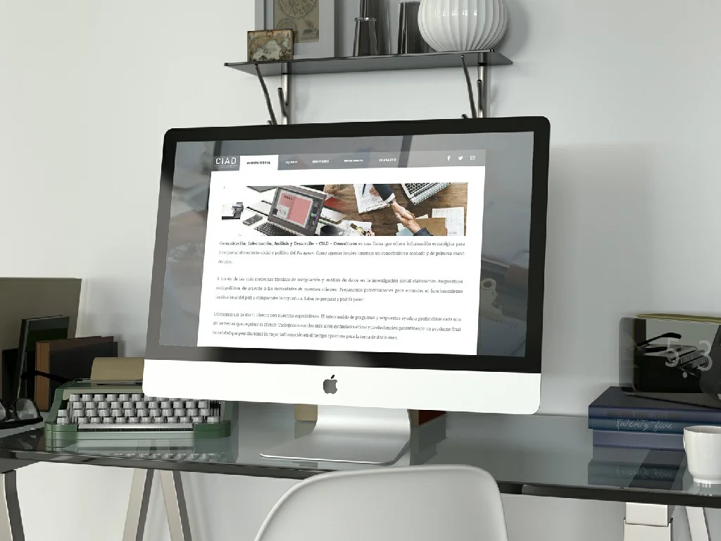 Sitio web de CIAD presentado en una computadora de escritorio